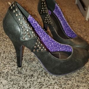 Black studded TUK pumps